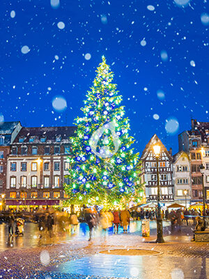 Christmas tree and xmas market at Kleber Square at night in medieval city of Strasbourg - capital of Noel, Alsace, France.