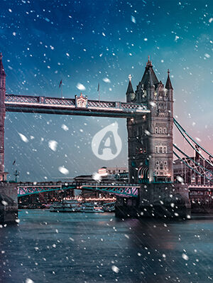 Tower Bridge with falling snow during sunset, London, United Kingdom