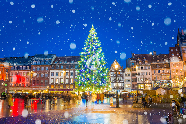 Christmas tree and xmas market at Kleber Square at night in medieval city of Strasbourg - capital of Noel, Alsace, France.